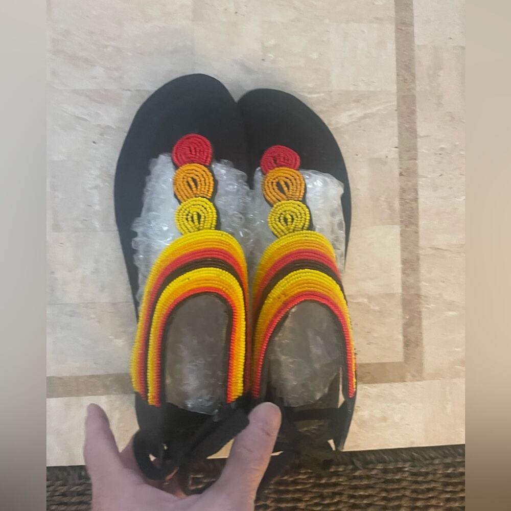 African beaded gladiator sandals.